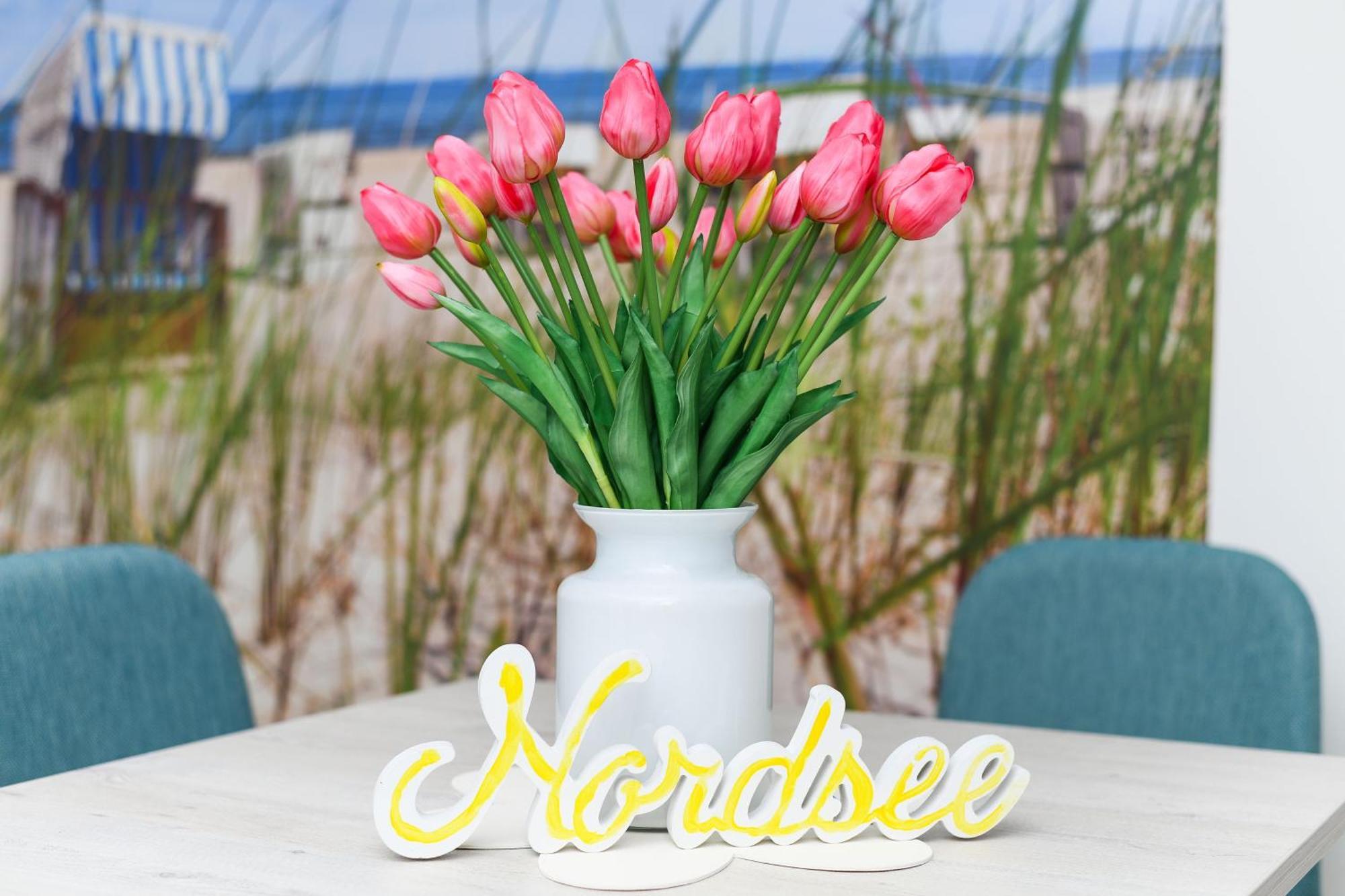 Ferienwohnungen Im Haus Strandkorb Bensersiel Esterno foto