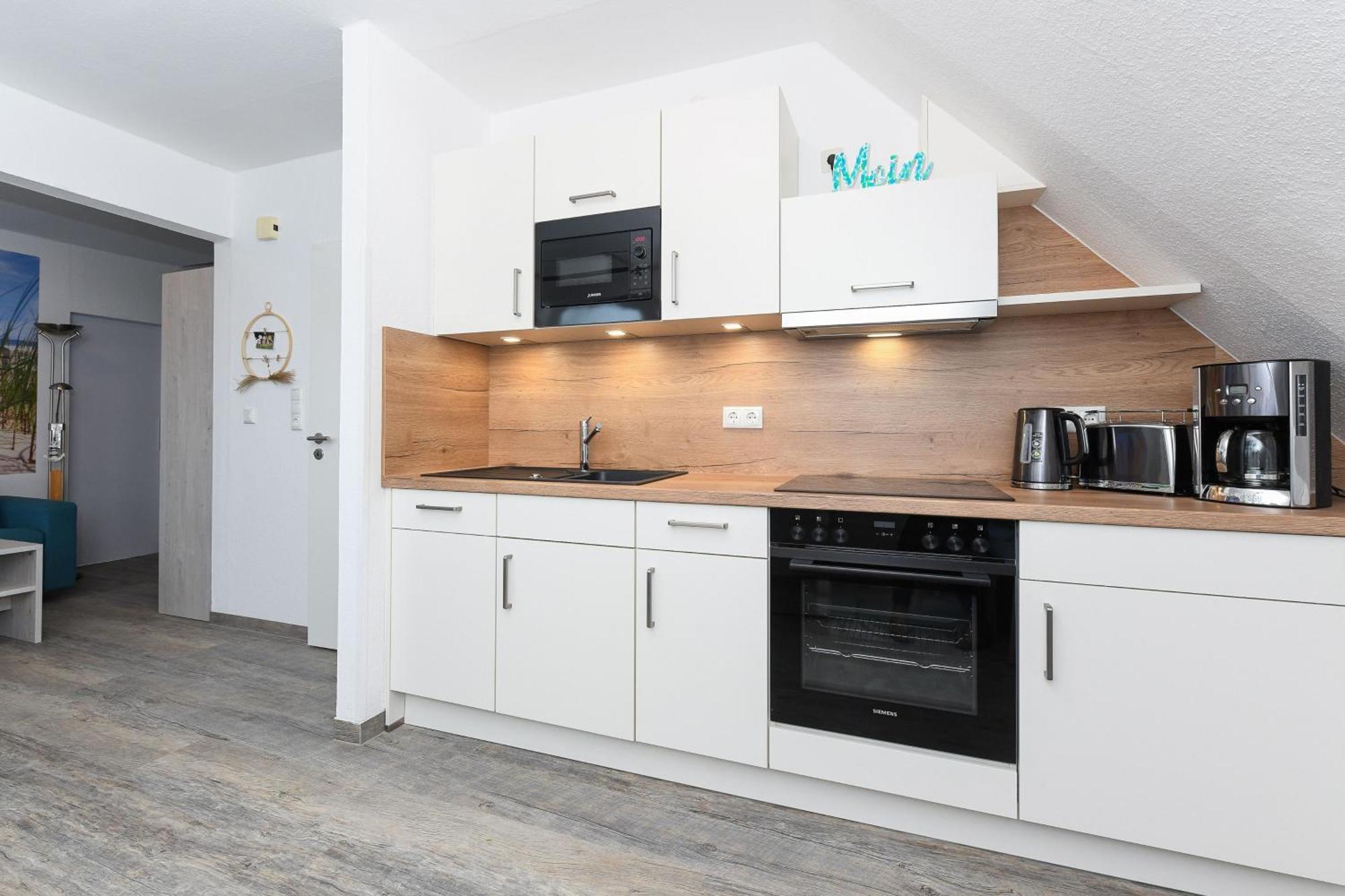 Ferienwohnungen Im Haus Strandkorb Bensersiel Esterno foto